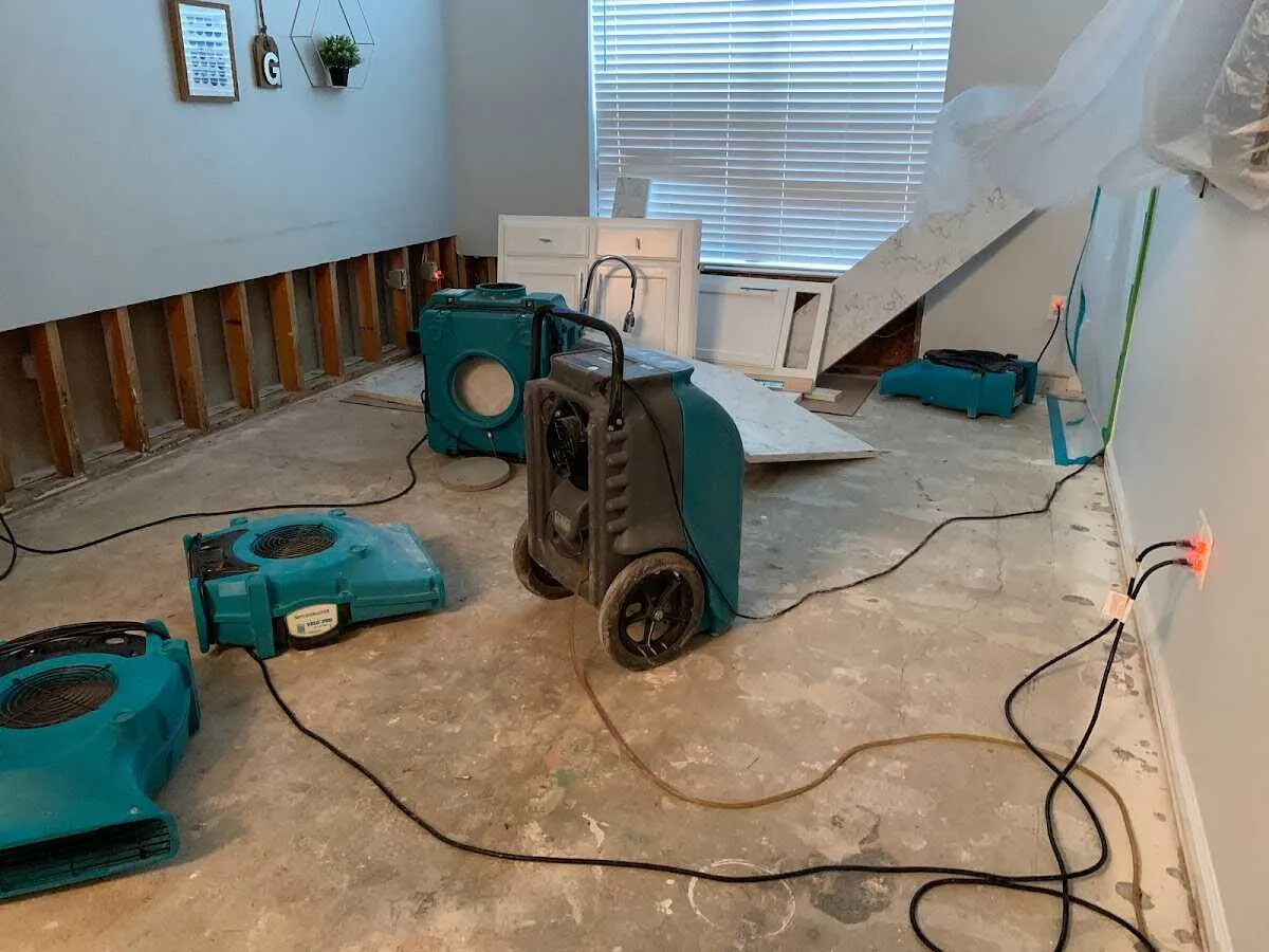 Dehumidifier in flood-cut room for Water Damage Restoration in West Caldwell